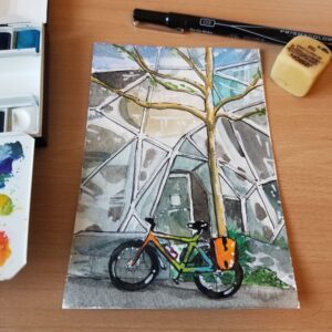 Watercolor postcard featuring a multi-colored commuter bike in front of the Amazon Spheres.
